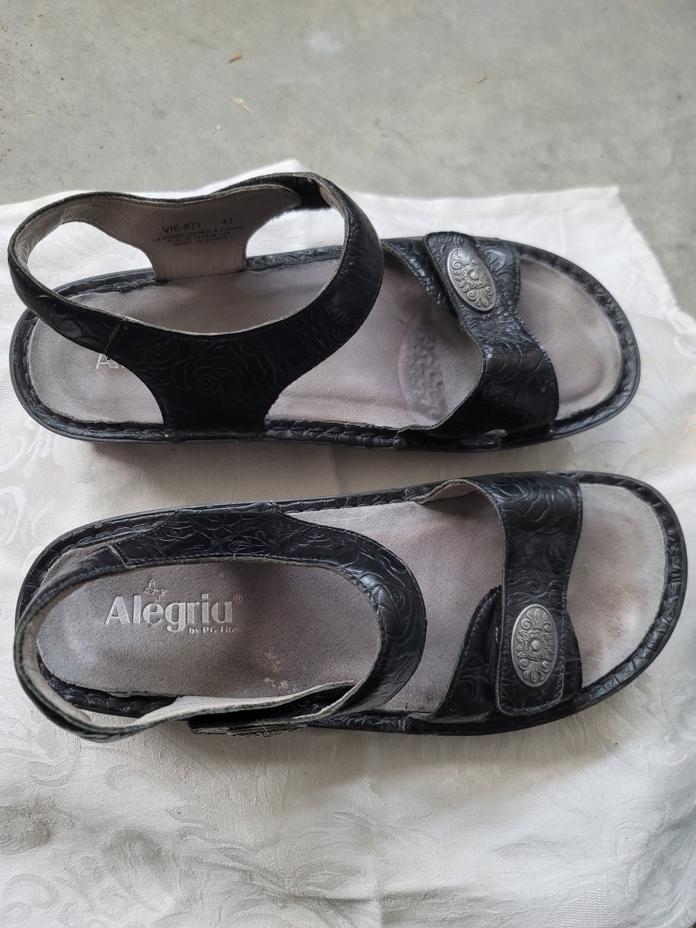 Alegria Black Floral-Embossed Leather Sandals